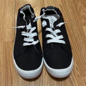 Black slip on sneakers